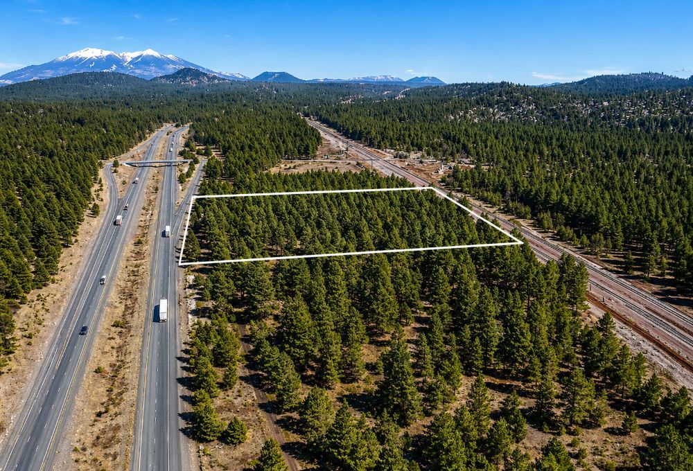 aerial view of 5 acre property for sale in Parks Arizona near Flagstaff showing highway access and ponderosa pine forest