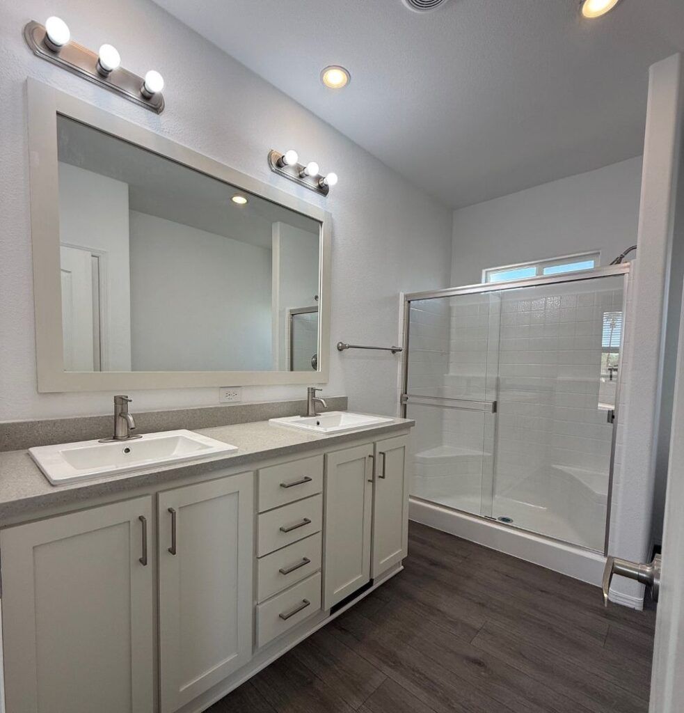 Modern bathroom with double vanity and updated fixtures Phoenix AZ